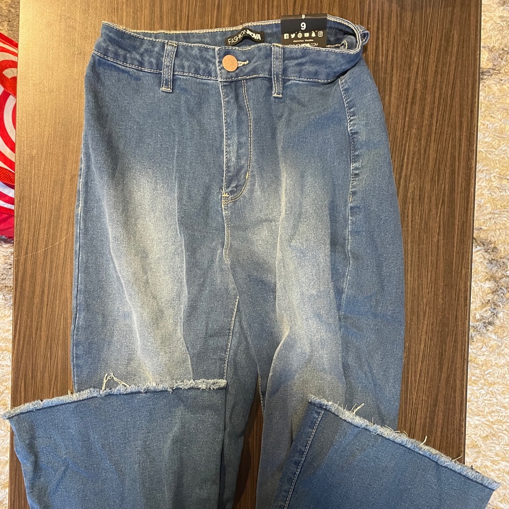 Long light wash blue jeans flared. New with tags. Size 9.